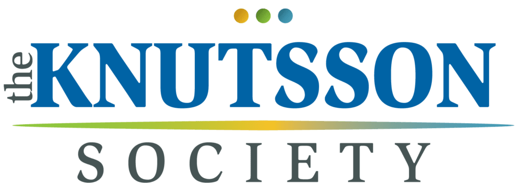 Logo of The Knutsson Society featuring the name in blue capital letters with three dots above and a horizontal gradient line below.