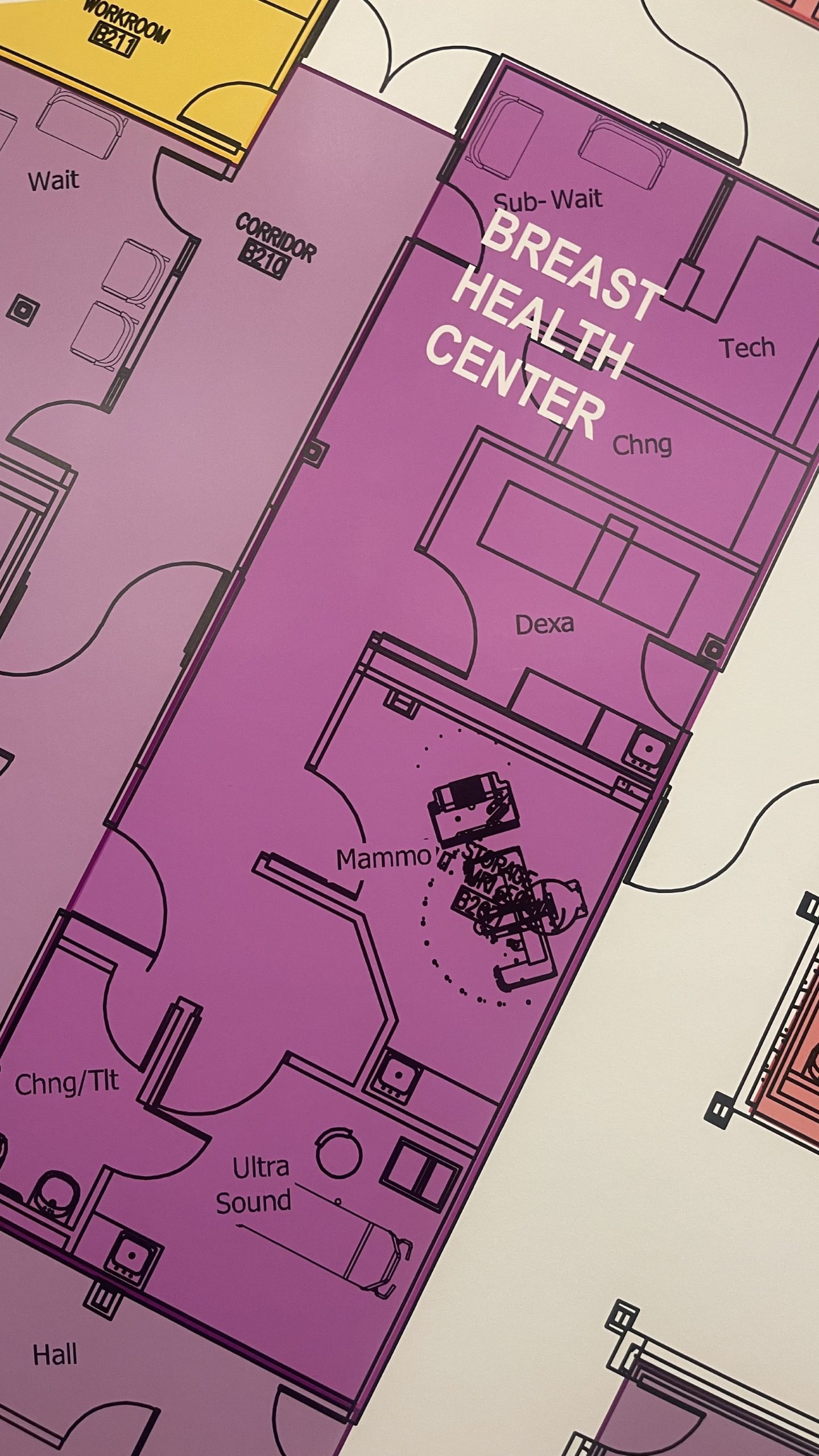 Floor plan of a Breast Health Center showing areas for mammography, ultrasound, changing rooms, and other facilities in purple shades.